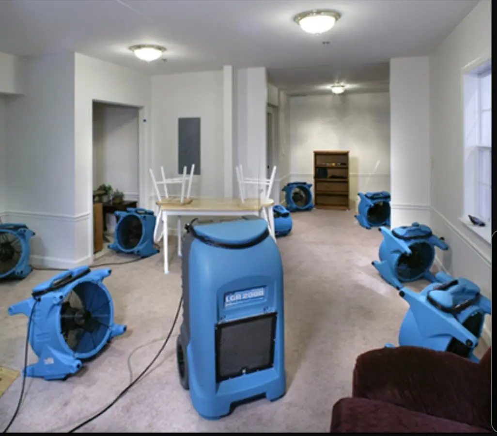 Air movers and dehumidifier setup for Water Damage Restoration in Maine